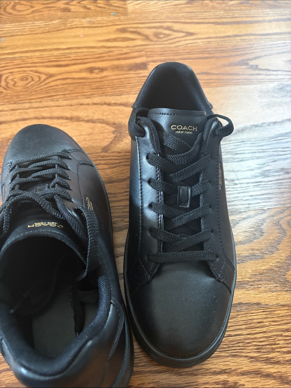 Coach Black Leather Lace-Up Sneakers with Gold Logo Accent